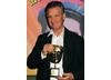 Michael Palin poses with his BAFTA Special Award at the Monty Python Reunion Event in New York on 15 October 2009 (© BAFTA)