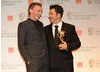 Actor Jamie Campbell Bower who presented the BAFTA for Original Music to French composer Ludovic Bource.