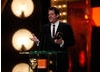 Michael Giacchino takes to the stage to accept his award in the Music category for the animated film Up. (BAFTA/Brian Ritchie).