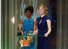 Actresses Naomie Harris and Rosamund Pike present the Awards for Production Design and Make-Up & Hair (pic:BAFTA / Camera Press).