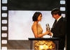 Will Wright receiving the Albert R. Broccoli Britannia Award for Worldwide Contribution to Entertainment from Olivia Munn. 
