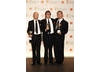 Rick Carter, Robert Stromberg and Kim Sinclair stand with their awards for Production Design on Avatar (BAFTA/Richard Kendal).