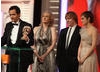 On stage at the 2011 Orange British Academy Film Awards; J.K. Rowling, David Heyman, Emma Watson and Rupert Grint.