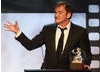 Quentin Tarantino with his Britannia Award. 