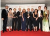 Lord Sugar and the team behind The Young Apprentice celebrate their BAFTA win alongside presenters Suranne Jones and Tom Ellis. 