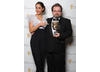 Charlie Philips shows off his  BAFTA for Editing Fiction with award presenter Oona Chaplin. Actress and grand-daughter of Charlie Chaplin. 