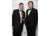 Stephen Moffat, winner of the Writer BAFTA, poses with actor and Award presenter Shaun Dooley
