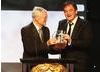 Roger Corman presenting Quentin Tarantino with the Britannia Award for Excellence in Directing.