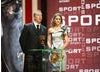 Olympic cycling champion Sir Chris Hoy and skelton gold medalist at this years Winter Olympics Amy Williams, present the Sport BAFTA. (BAFTA/Steve Butler)