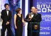 The Thick of It creater Armando Iannucci and cast collect the Situation Comedy award for their political BBC hit. (BAFTA/Steve Butler)