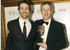 Actor Ralph Little presents EA's Keith Ramsdale with the Sports BAFTA for footballing favorite FIFA 10 (BAFTA/Steve Butler).