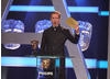 Actor Damien Lewis holds up the winner's envelope for the Supporting Actress category.