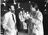 Director Terry Gilliam and lead actor Robin Williams on the set of The Fisher King (1991).