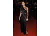 Thandie Newton arrived in an off-the-shoulder, satin black dress by designer Alexander McQueen with Jimmy Choo shoes. She carried a Louboutin bag and wore Azagury Partridge jewellery (pic: BAFTA / Richard Kendal).