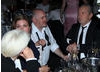 Dara O'Briain and Alan Sugar are deep in discussion at the Television Awards After Party. 