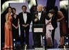 The Holby City team collect their Continuing Drama BAFTA at the British Academy Television Awards. 