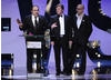 Harry Hill picks up his second BAFTA at the British Academy Television Awards in 2008. 