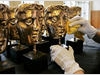 The famous BAFTA masks receive a final polish before being presented at the Orange British Academy Film Awards (pic: BAFTA / Marc Hoberman).