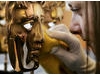 BAFTA masks are polished.