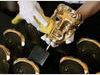 BAFTA masks are polished before the Orange British Academy Film Awards (BAFTA/Marc Hoberman).