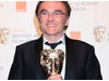 Danny Boyle celebrates his Director BAFTA for Slumdog Millionaire before the film also picked up the Best Film Award in 2009.