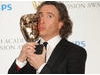 Steve Coogan won the BAFTA for Male Performance in a Comedy Programme for Michael Winterbottom's The Trip, co-starring Rob Brydon. (Pic: BAFTA/Richard Kendal)