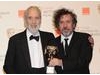 Lee was presented the Academy Fellowship by filmmaker Tim Burton. (Pic: BAFTA/Richard Kendal)