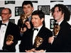 Geoffrey Perkins celebrates at the Television Awards in 1996 with the Father Ted team. 