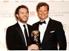 Duncan Jones celebrates with actor Colin Firth after winning the Outstanding Debut by a British Writer, Director of Producer Award for his sci-fi adventure Moon (BAFTA/Richard Kendal)