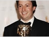 David Mitchell, winner of the Comedy Performance Award for his role in Peep Show, celebrates backstage at the British Academy Television Awards in 2009 (BAFTA / Richard Kendal).