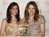 Skins stars Kaya Scodelano and Hanna Murray celebrate their win in the only category voted for by the public, the Philips Audience Award (BAFTA/ Richard Kendal).