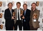 David Sproxton, citation reader Alex Pettyfer, Nick Park and Steve Box celebrate their Feature Film win for Wallace and Gromit The Curse of the Were-Rabbit