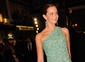 Actress Emily Blunt poses for the press on the red carpet.