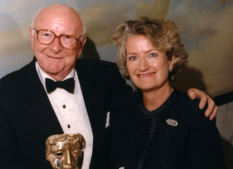 Sir Bill Cotton with his BAFTA Fellowship in 1998, pictured with his wife Lady Burgess.
