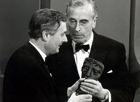 Richard Cawston collects the Desmond Davis Award from Lord Mountbatten at the Society of Film and Television Arts Awards in 1970. Richard Cawston collects the Desmond Davis Award from Lord Mountbatten at the Society of Film and Television Arts Awards in 1970.