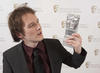 Will Anderson with his award for Animation