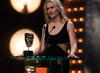 Actress Kate Winslet proudly introduces the award for Leading Actor (BAFTA/Brian Ritchie).