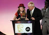 Leah Cooper collects the CBBC me and my movie Award at the EA British Academy Children's Awards in 2008.