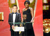 Athletes Tom Daley and Denise Lewis onstage at the British Academy Television Awards. 