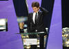 Andrew Garfield collecting his Actor BAFTA at the British Academy Television Awards. 
