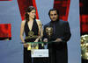 Charity Wakefiled and Sanjeev Bhaskar onstage at the British Academy Television Awards. 