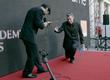 Mark Kermode receives the winner's envelope from Andy Serkis in ceremonial fashion.