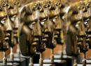 BAFTA masks wait to be presented at the Orange British Academy Film Awards.