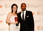 Kristen Stewart celebrates winning the Orange Rising Star Award with the winner in 2009, Noel Clarke (BAFTA/Richard Kendal). Orange Rising Star Award