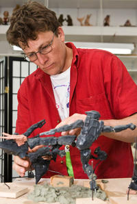 Richard Taylor amending sculptures of the Halo Master Chief and grunts. Richard Taylor