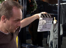A crew member prepares the the next take on the shoot of the Film Awards trailer. Film: Trailer 2