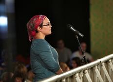 July 17: An audience member poses her question to Paul about the importance of film clubs in schools in order to inspire children's interest in film as a craft (Picture: Jonathan Birch)