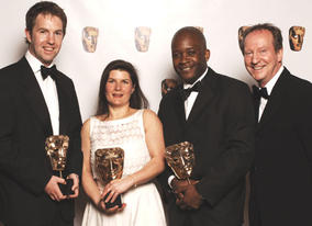 Mark Walters, Chris Grubb and Louise Braham, winners of the Award for Titles, with citation reader Bill Paterson.