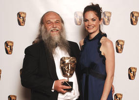 Dave King, winner of the Editing Factual Award for Rain In My Heart, with citation reader Ruth Wilson.