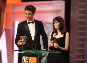 Max Irons (Red Riding Hood) and Felicity Jones (Cemetery Junction) present the BAFTAs for Sound and Editing. (Pic: BAFTA/ Stephen Butler)